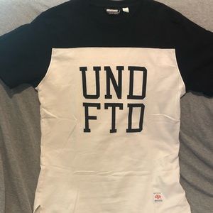 NWOT UNDEFEATED shirt, size large.